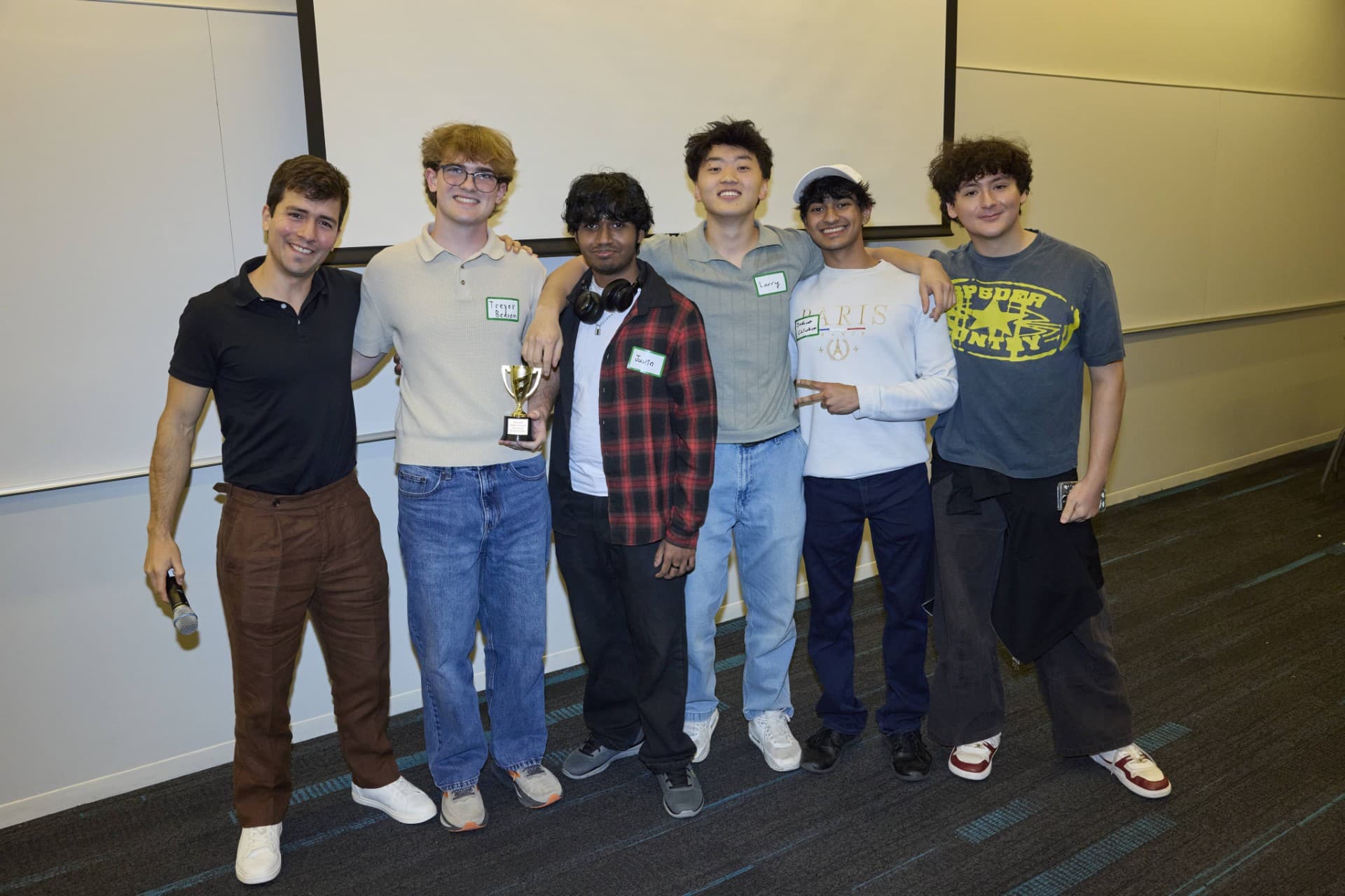 Distill team with the Copilot hackathon trophy